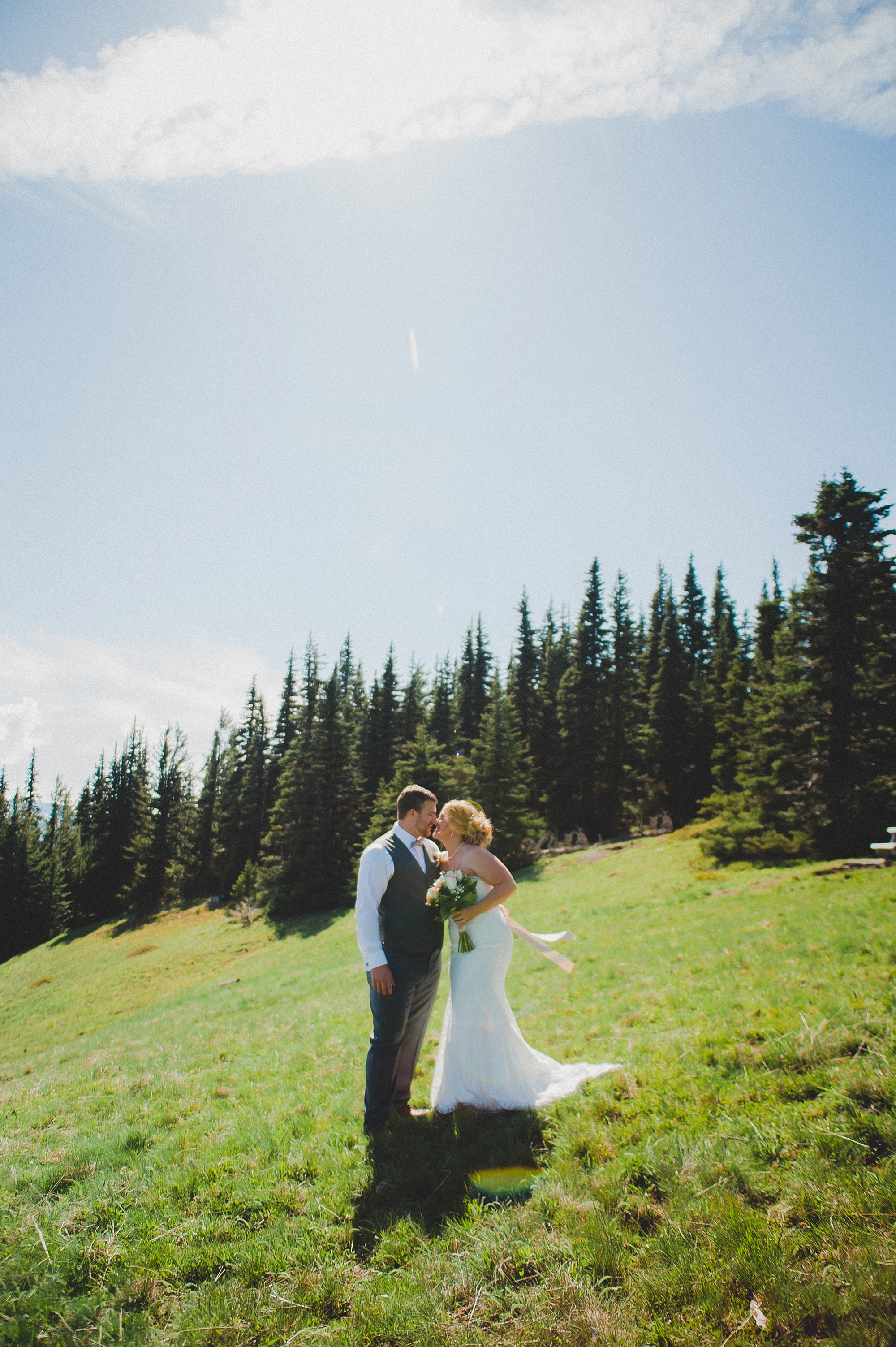 Olympic National Park Bride and groom kissing at hurricane ridge