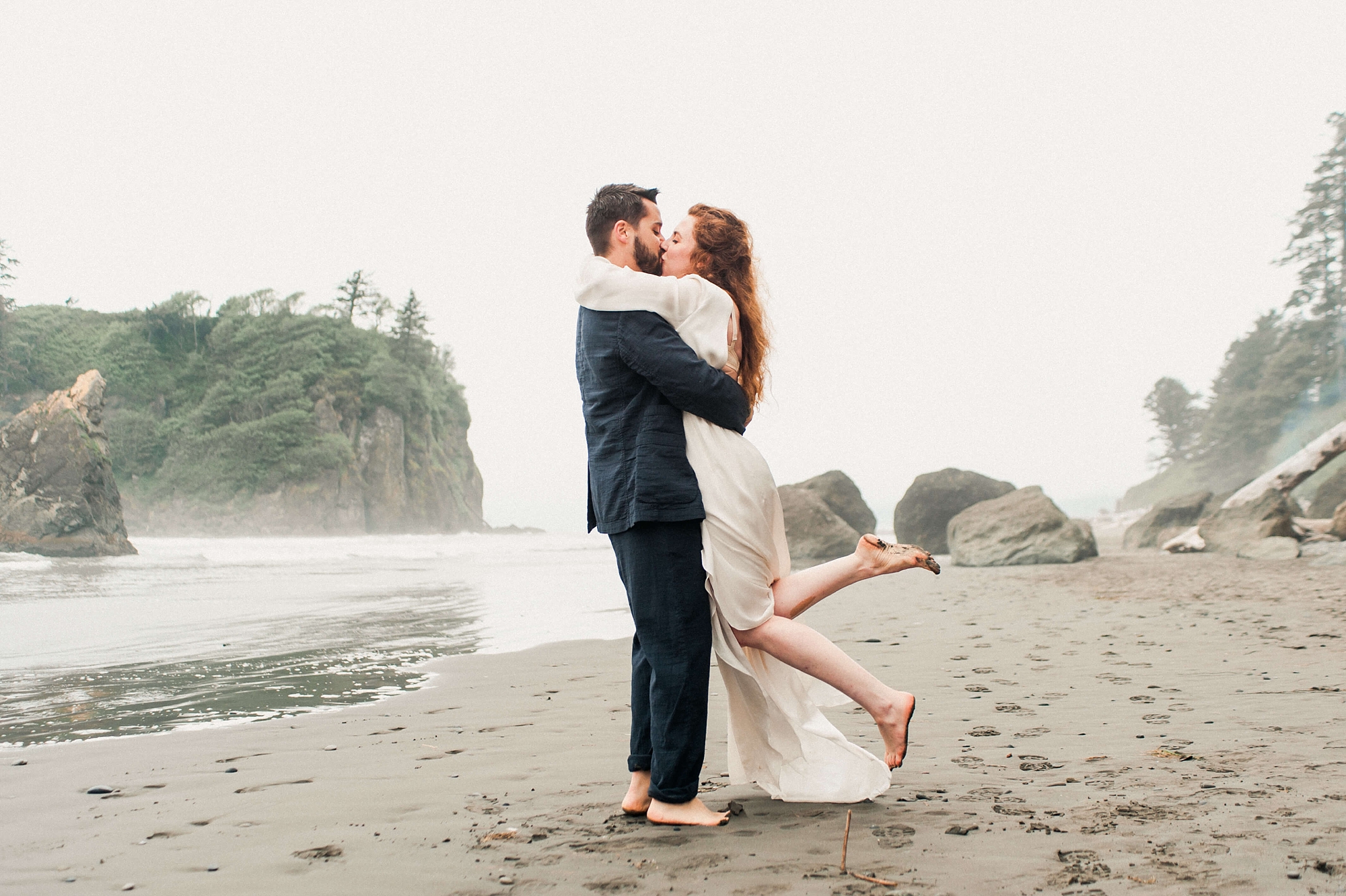 Bride and groom with seastacks at Ruby Beach Washington State