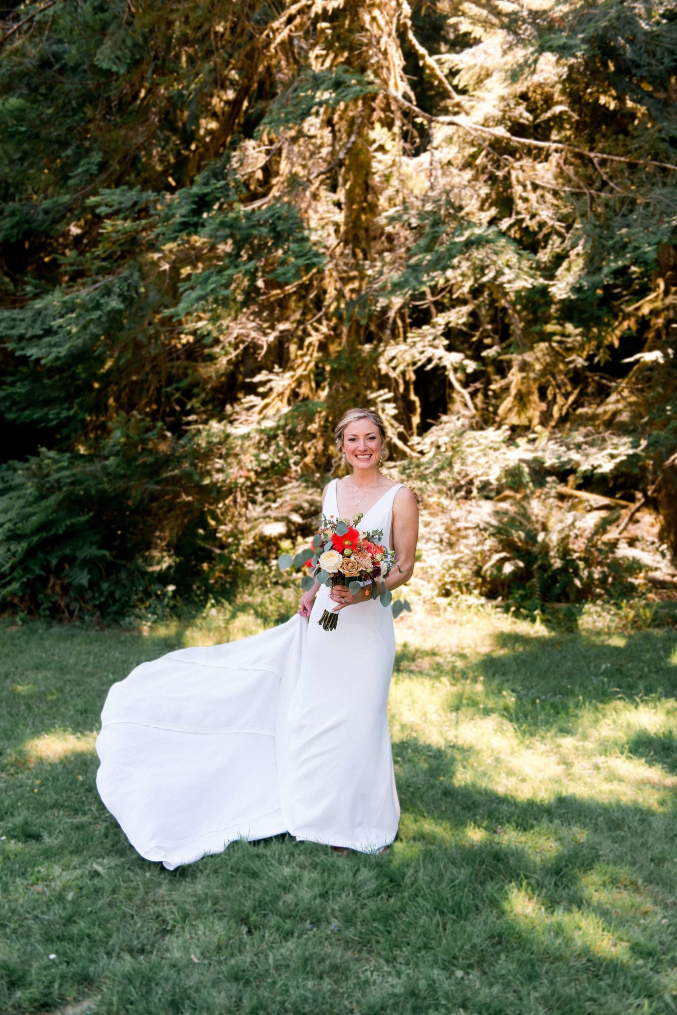 Bride twirling dress before a NatureBridge Wedding