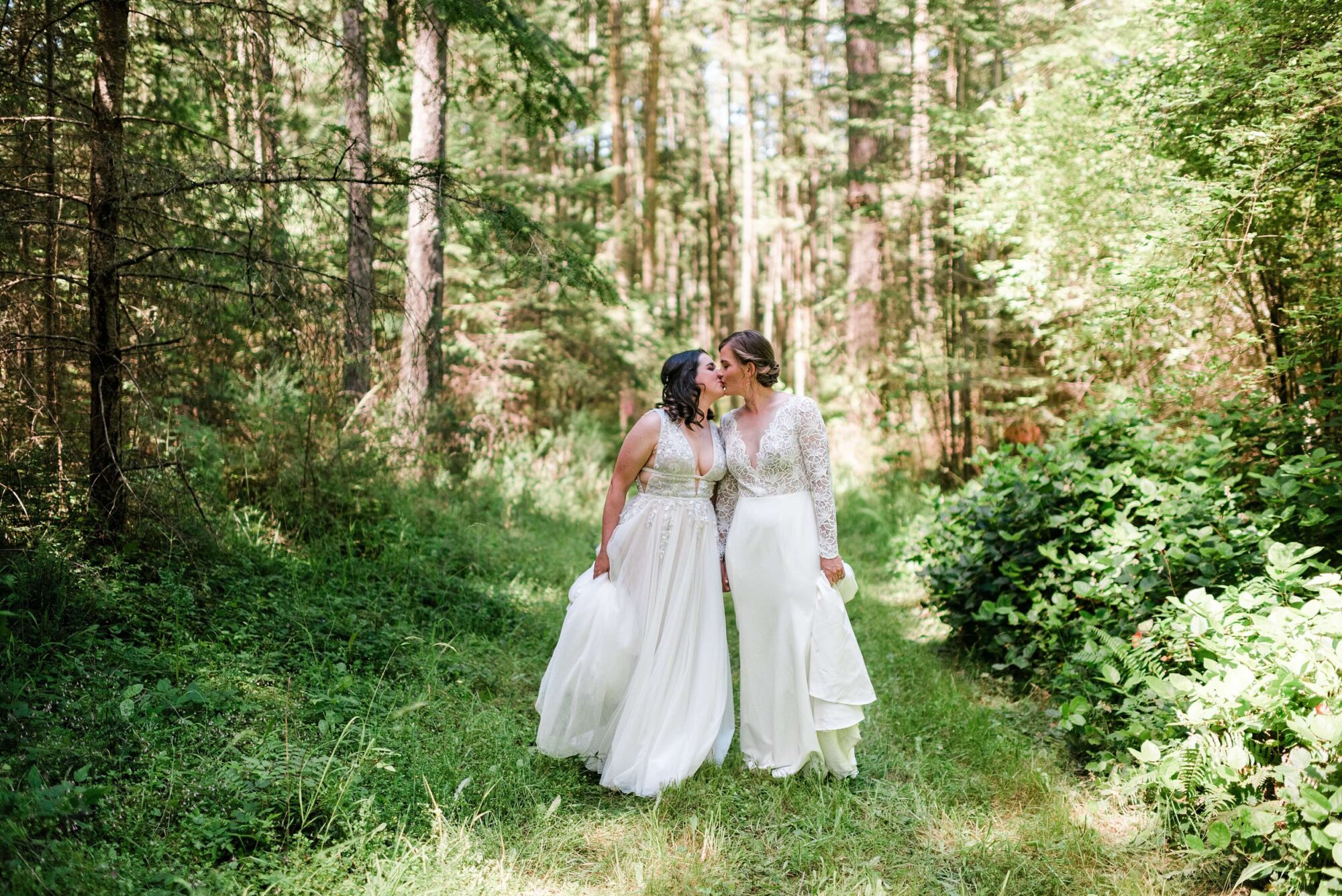 LGTBQ+ Brides in the forest at Saltwater Farm on San Juan Island