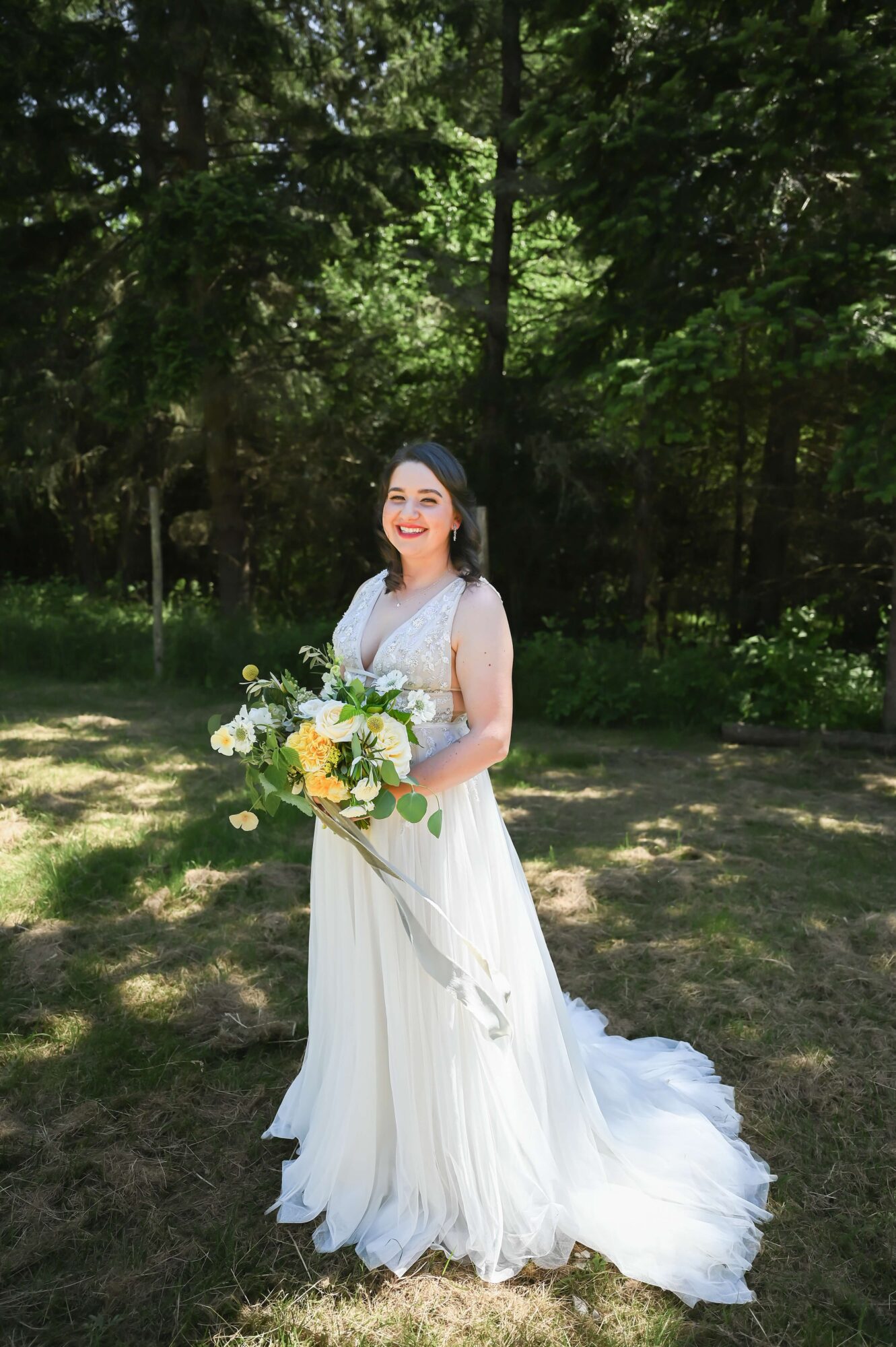 A stunning LGTBQ+ Bride in the garden at Saltwater Farm on San Juan Island
