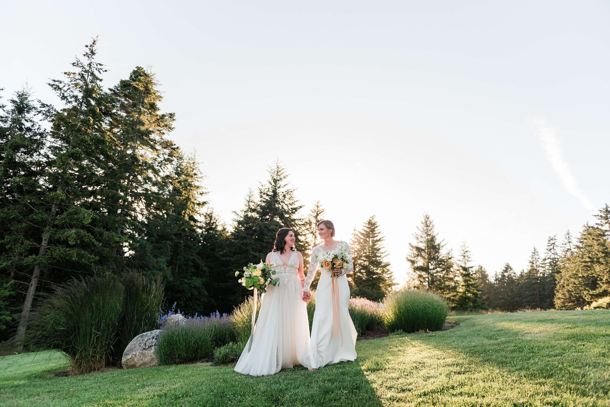 Two stunning brides at a a LGTBQ+ wedding at Saltwater Farm on San Juan Island