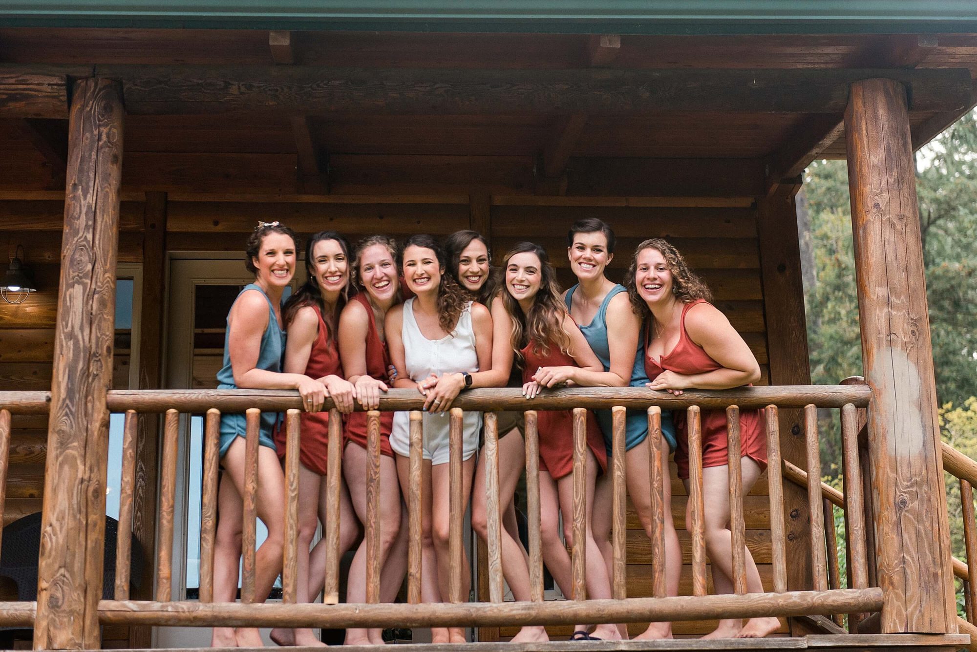 bride with her bridesmaids while getting ready at their Lakedale Resort Wedding