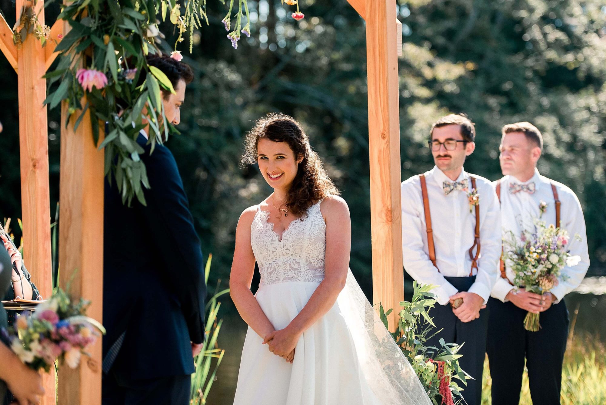 bride smiling sheepishly at their Lakedale Resort Wedding