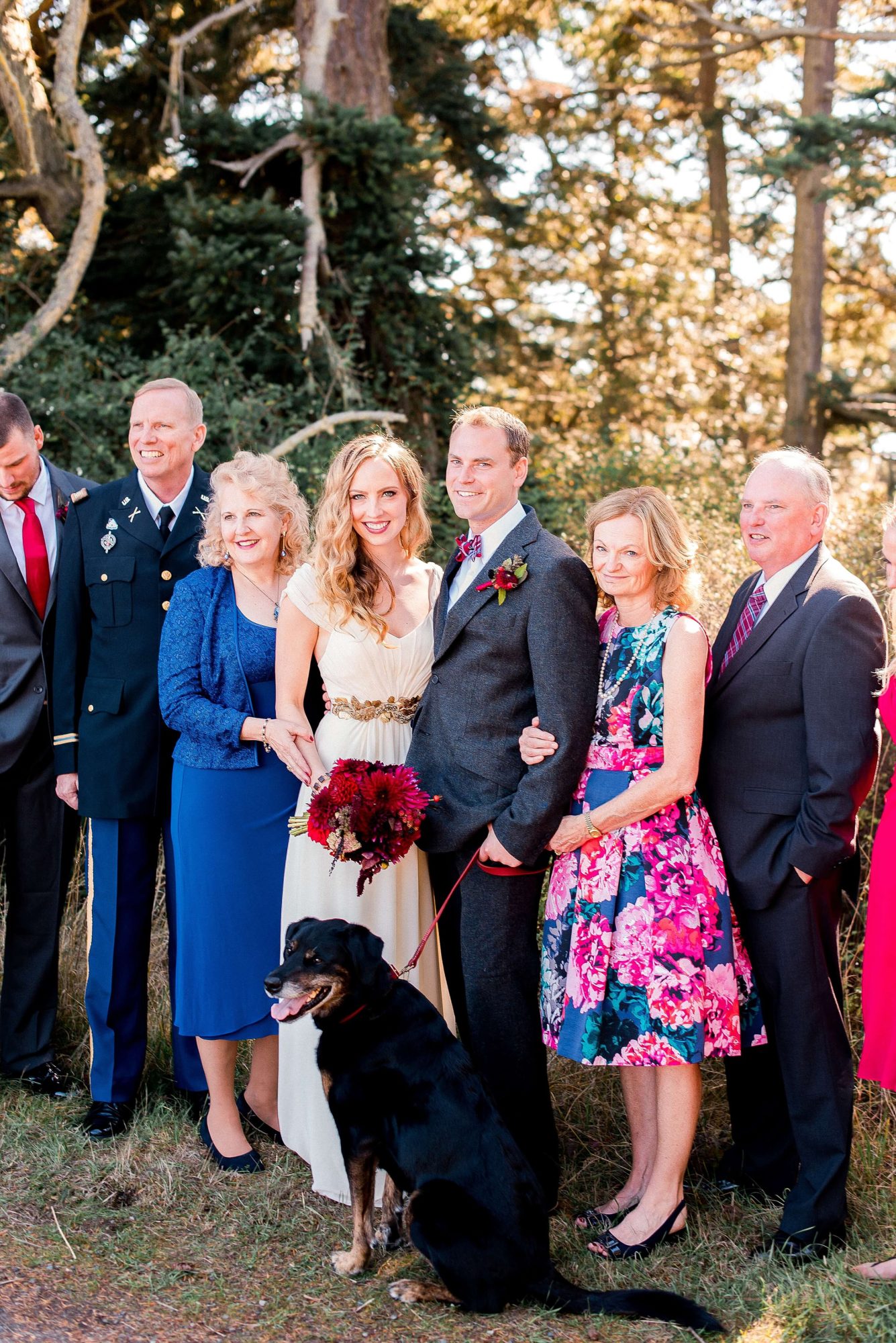bride and groom with their family and dog at their Whidbey Island Wedding
