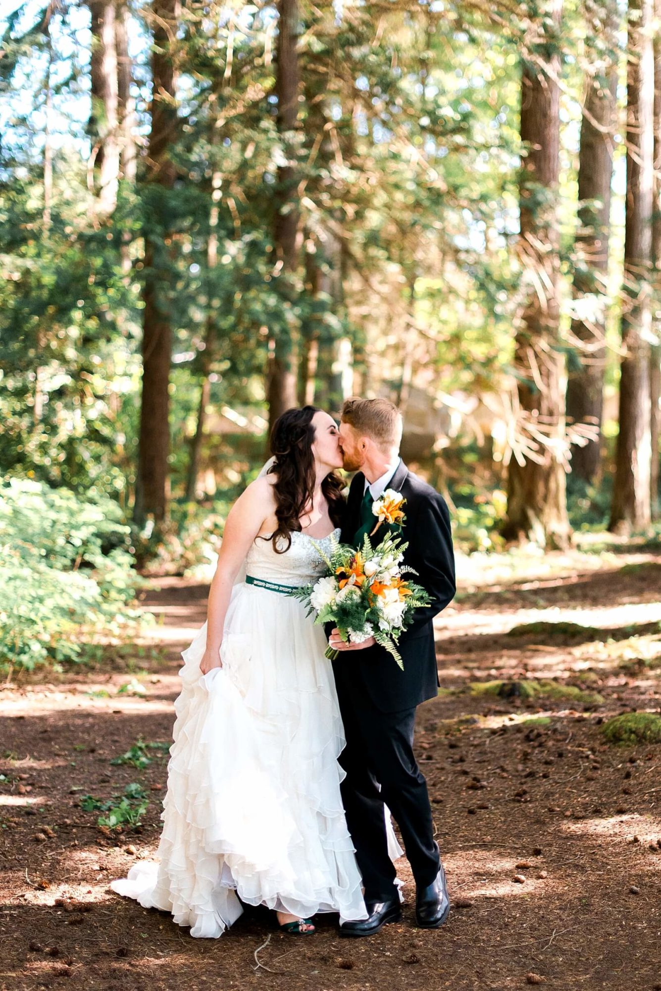 Bride and groom in the forest in Kitsap County