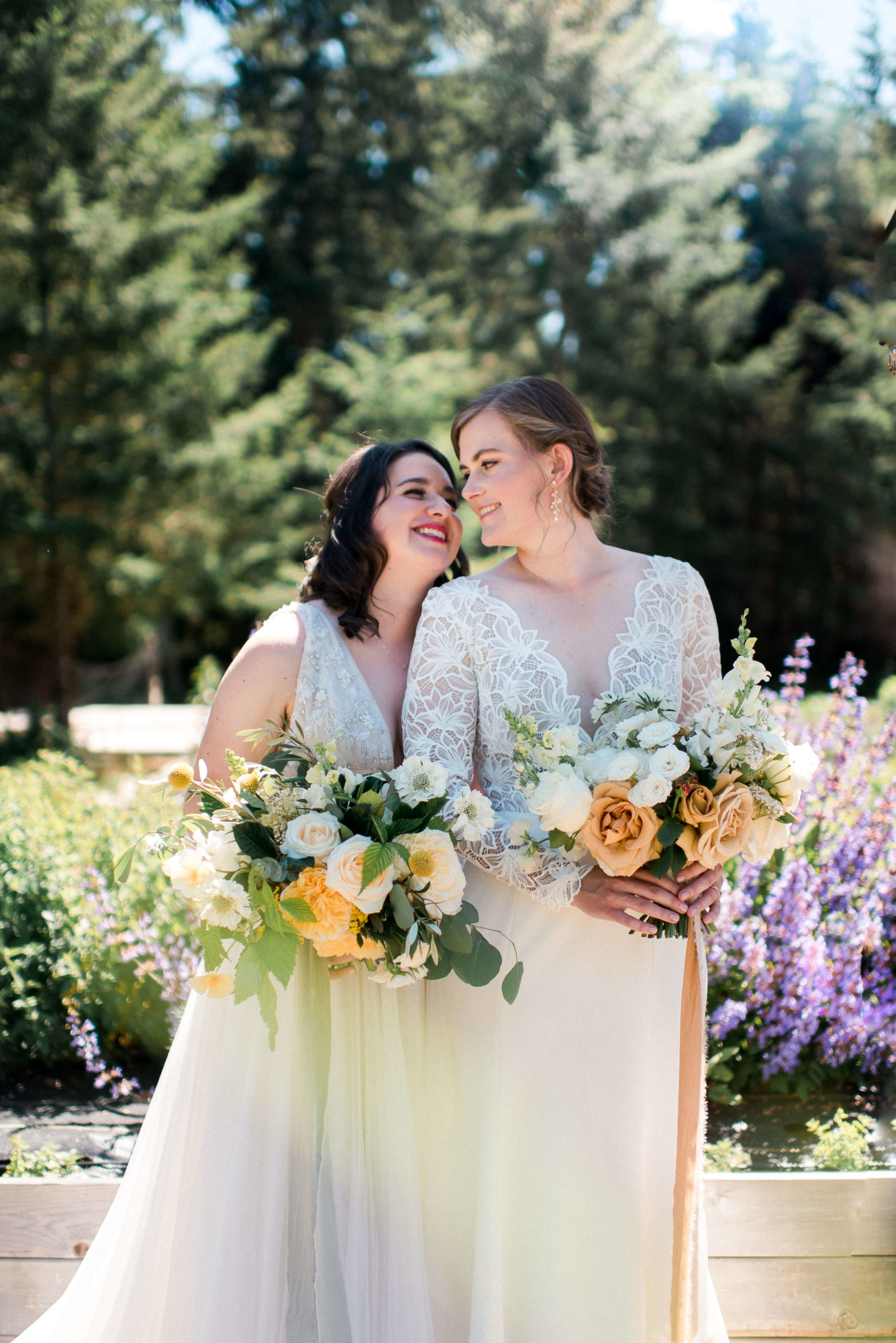 LGTBQ+ brides in a garden at a Kitsap County wedding
