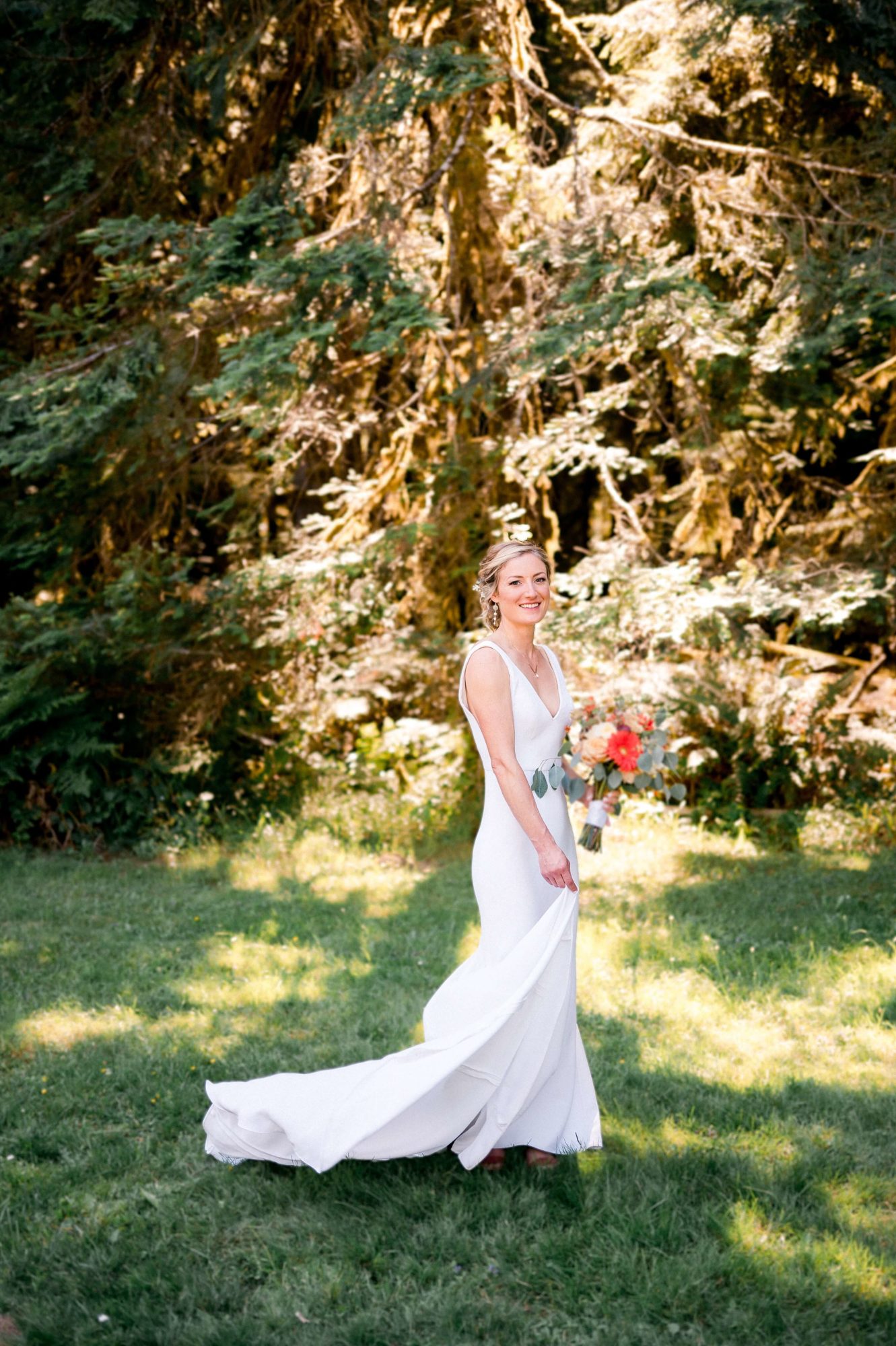Bride in a forest at a Vashon Island wedding venue