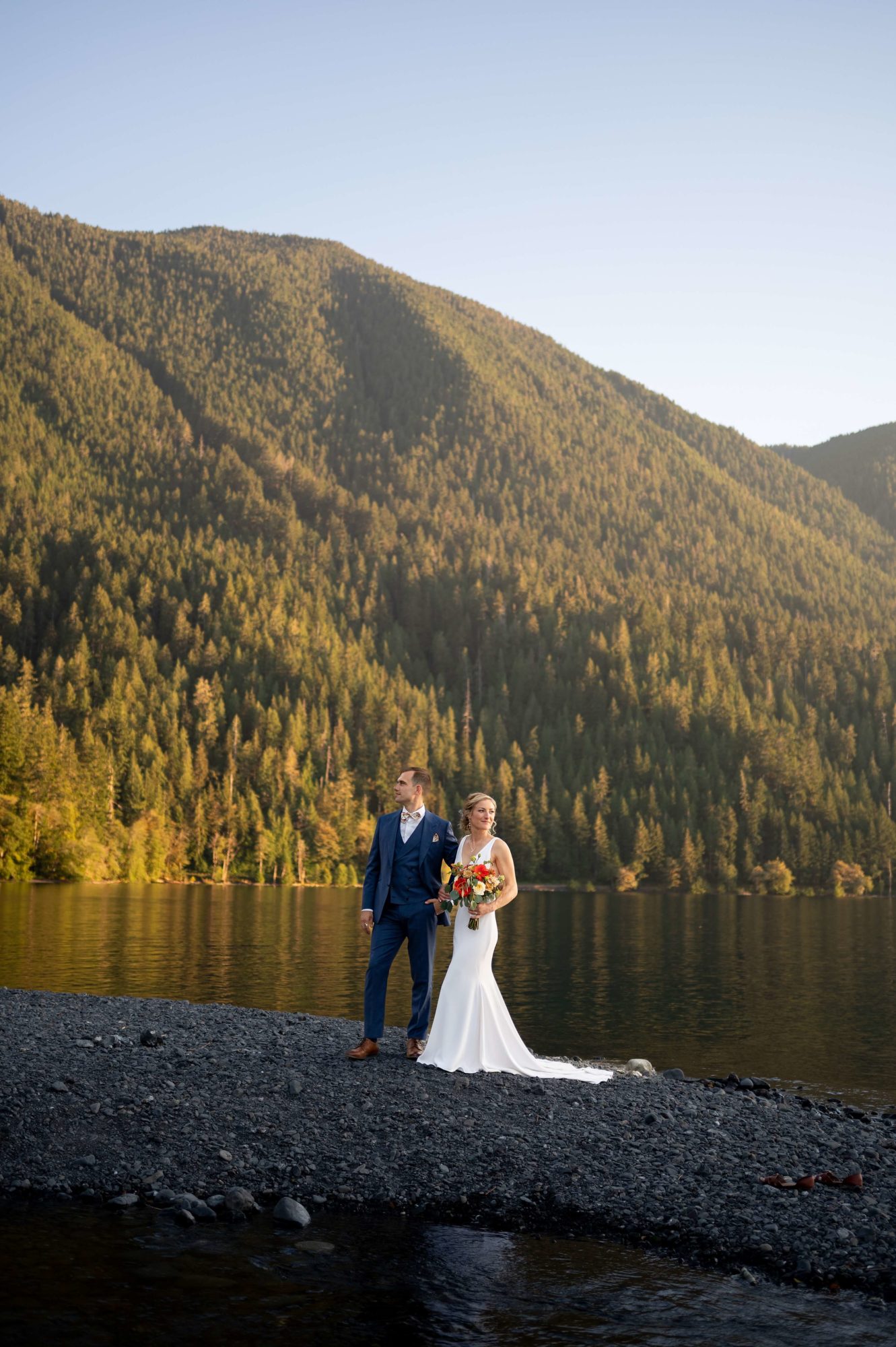 Bride and groom at sunset at Lake Crescent wedding