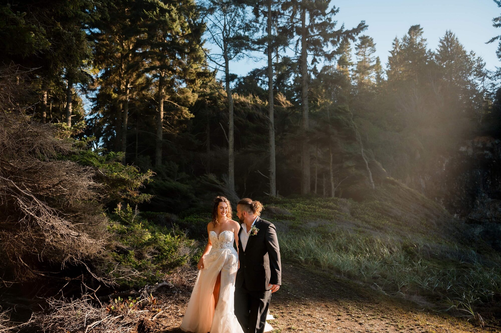 Bride and groom in the forest at sunset on the Olympic Peninsula