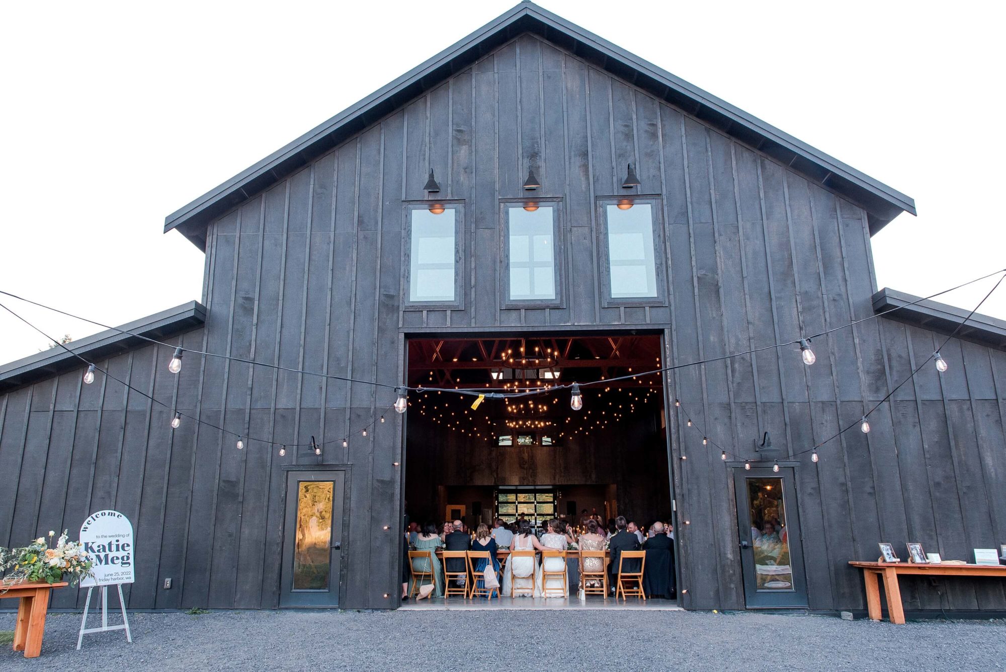 outside of the grey barn at Saltwater Farm Wedding