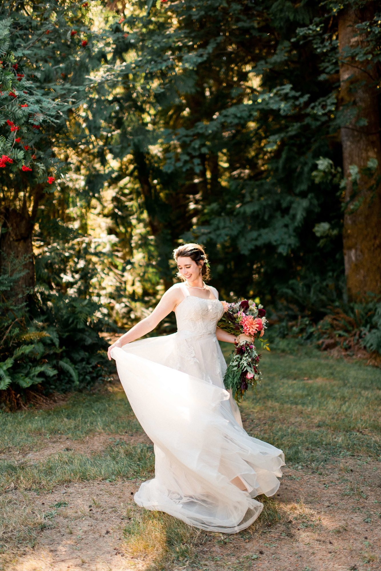 Bride in the woods at Fern Acres Forks Wedding Venue