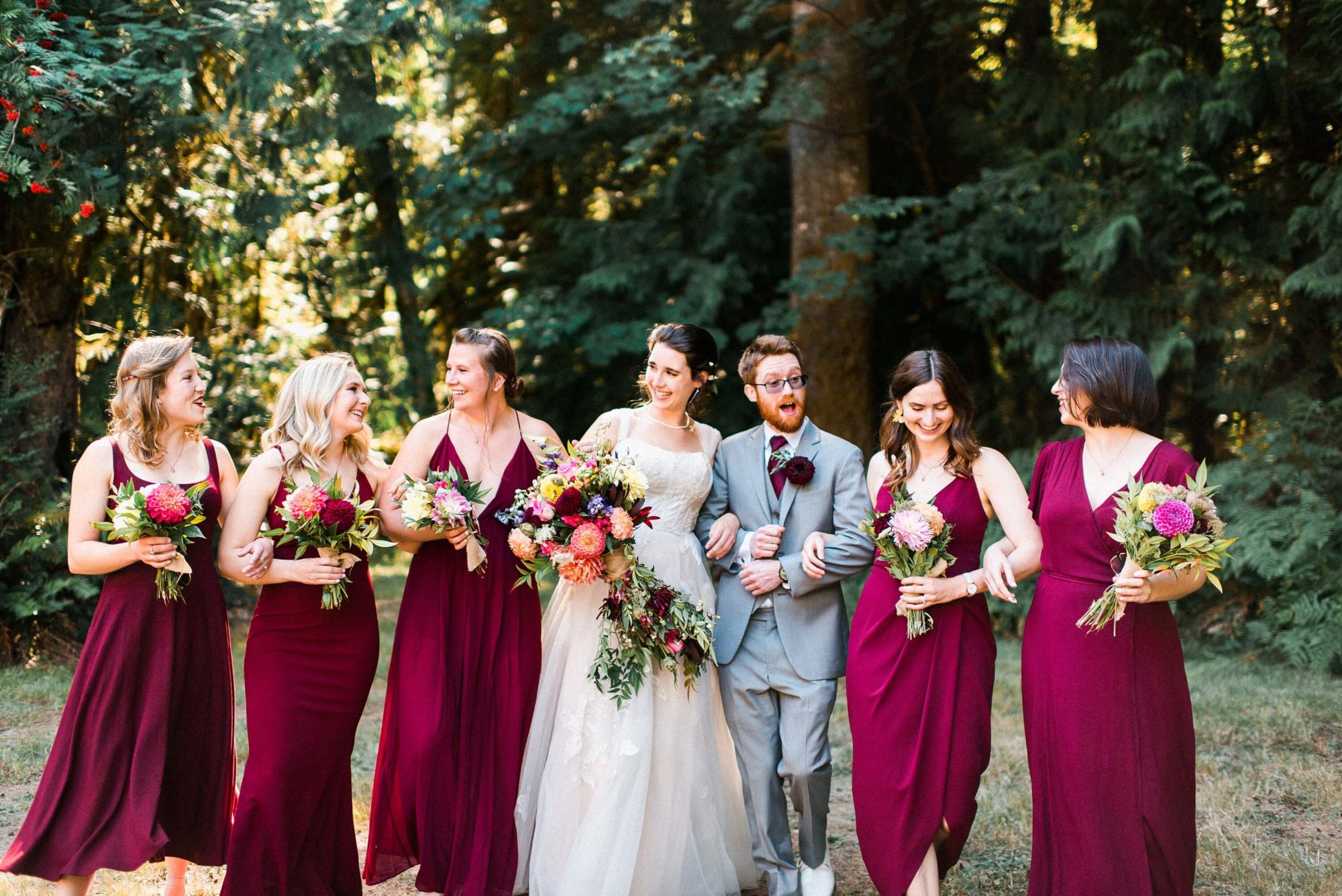 Bride and bridesmaids and bridesman in a forest on Vashon Island