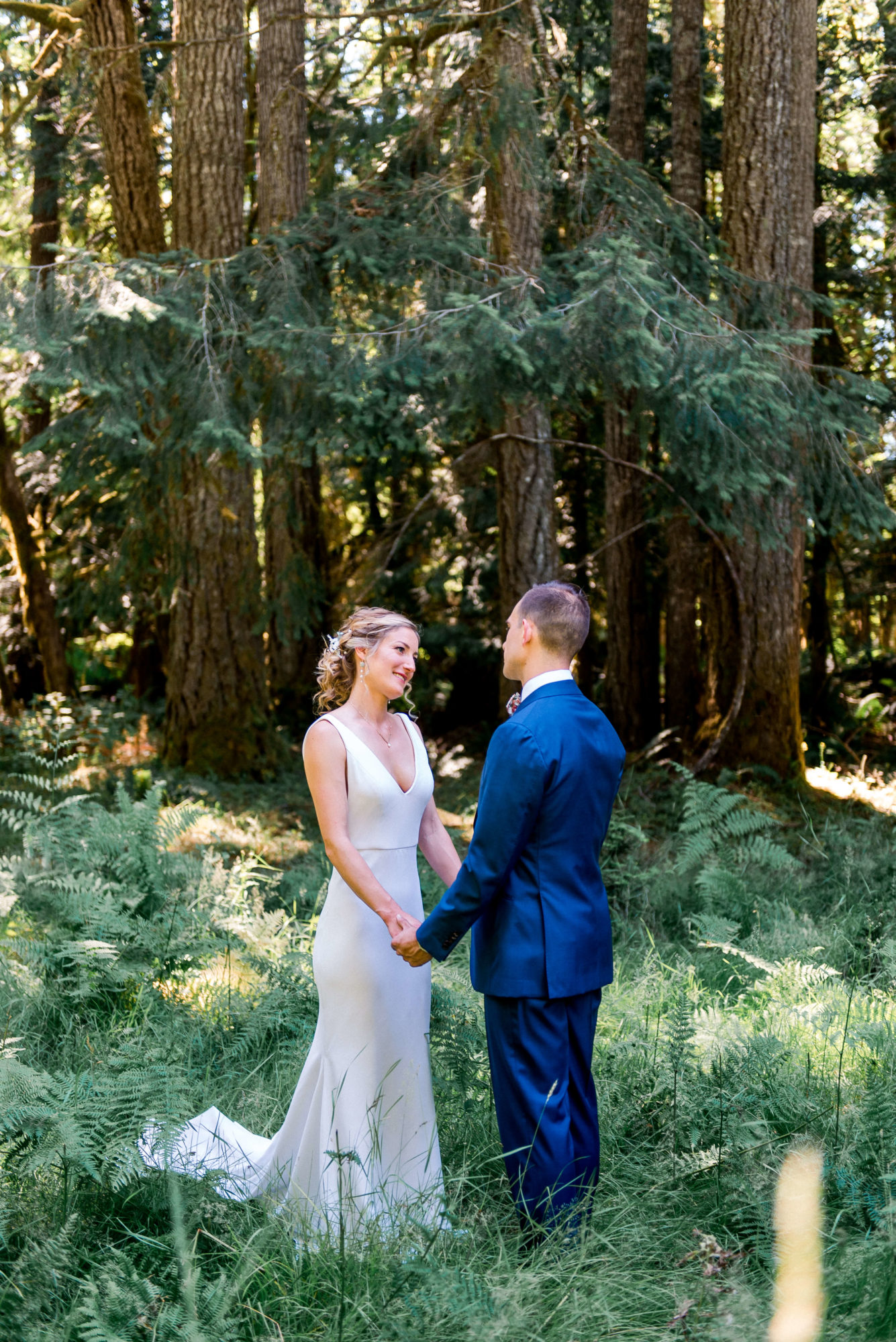 Bride and groom in a forest on vashon Island