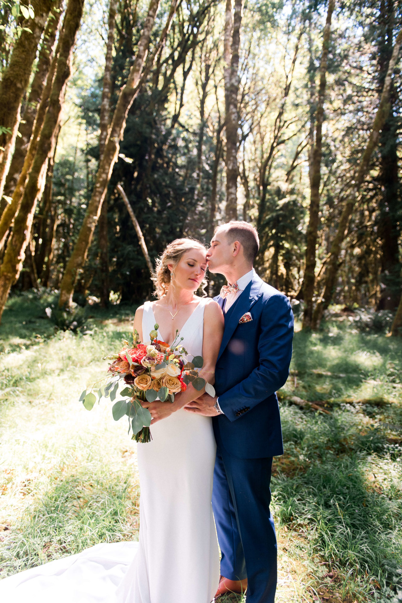 Bride and Groom in a sunny forest