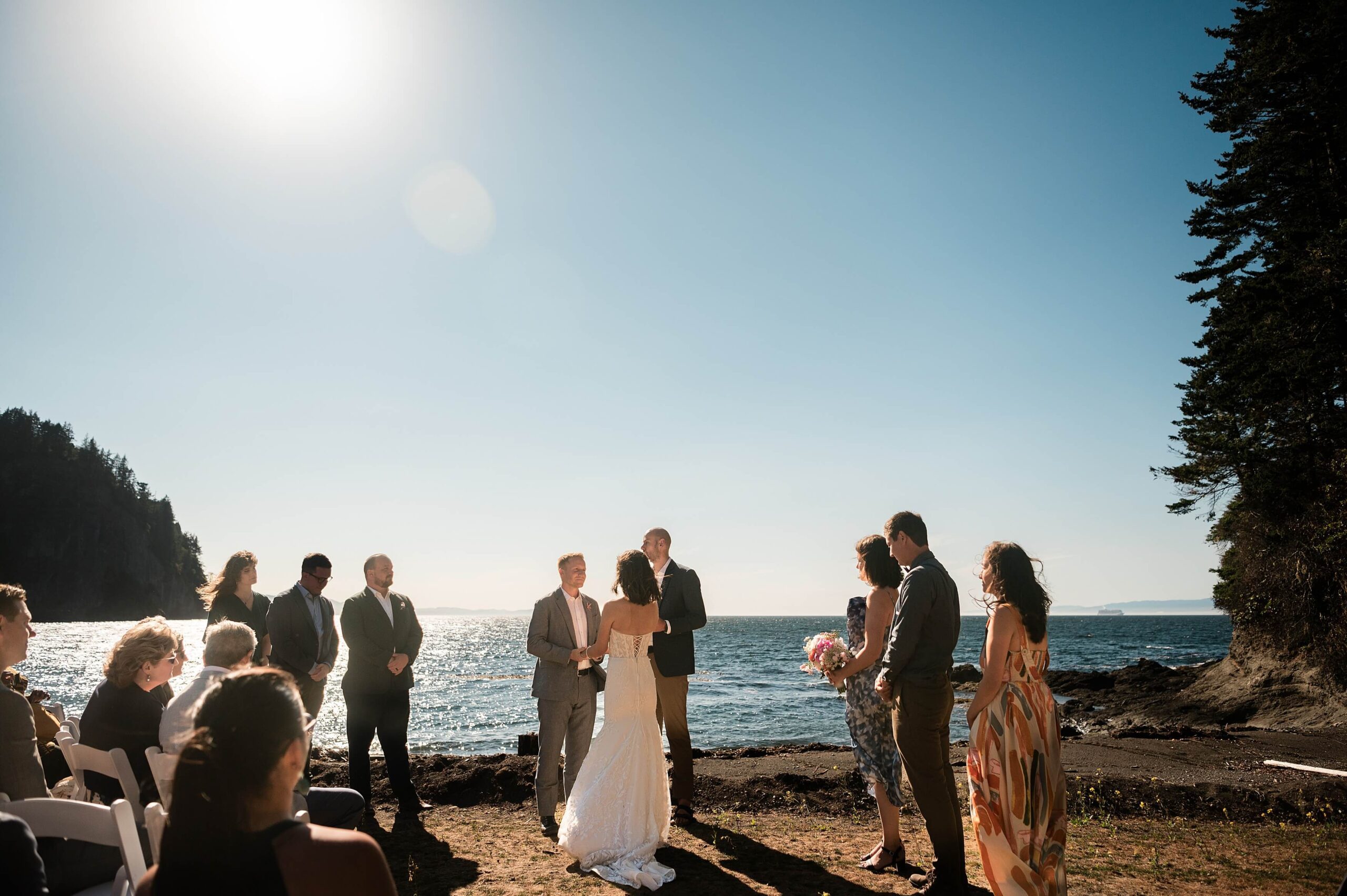 Bride and groom on the beach at Agate Beach Lodge outside Port Angeles Washington