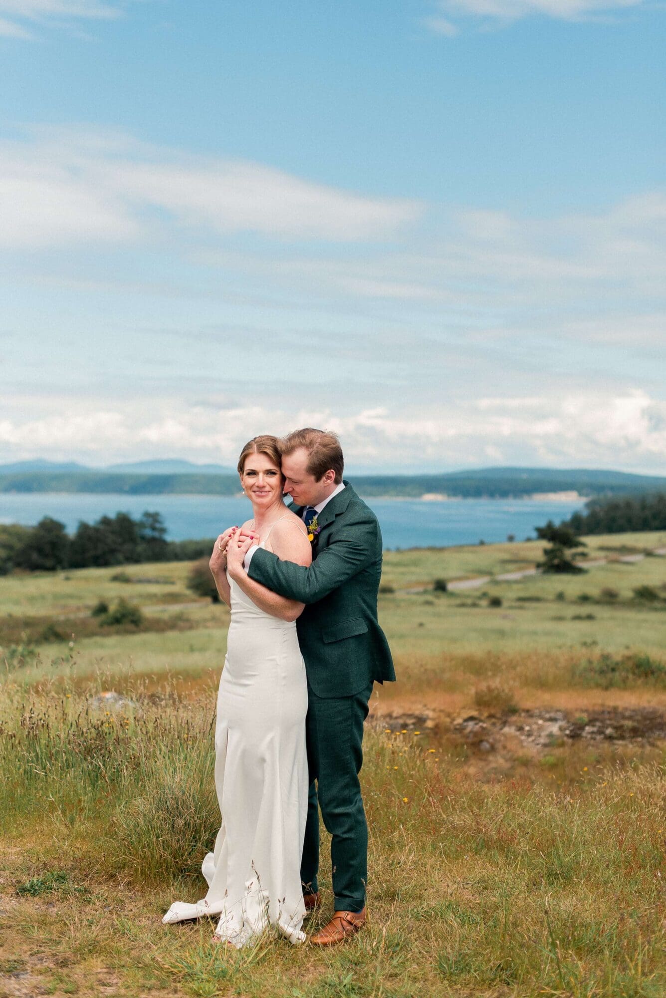 Bride and Groom on Vashon Island with a beautiful view of Puget Sound in the background